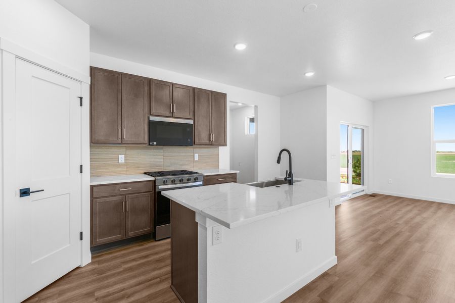 Representative furnished interior of a home built from the Bloom Series - Wallflower by Brightland Homes in Granary, Johnstown (Image 12). Representative furnished interior of a home built from the Bloom Series - Wallflower by Brightland Homes in Granary, Johnstown (Image 12).