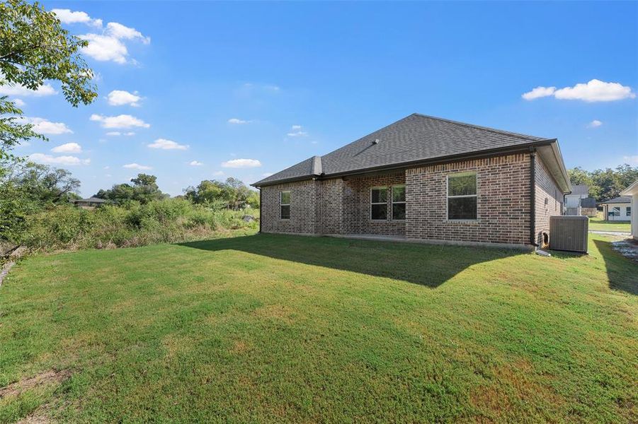 Exterior details and patio area of a home in , West (Image 2). Exterior details and patio area of a home in , West (Image 2).