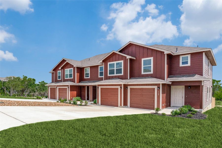 Craftsman-style home with an attached garage, board and batten siding, driveway, and a front yard Craftsman-style home with an attached garage, board and batten siding, driveway, and a front yard