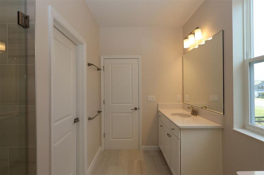 Furnished interior view inside a new home in Lake Star at Ovation, Winter Garden (Image 15).