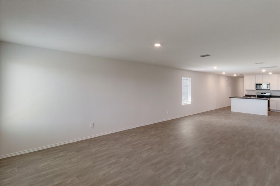Spacious, unfurnished interior of a new home in Watermill, Uhland (Image 7).