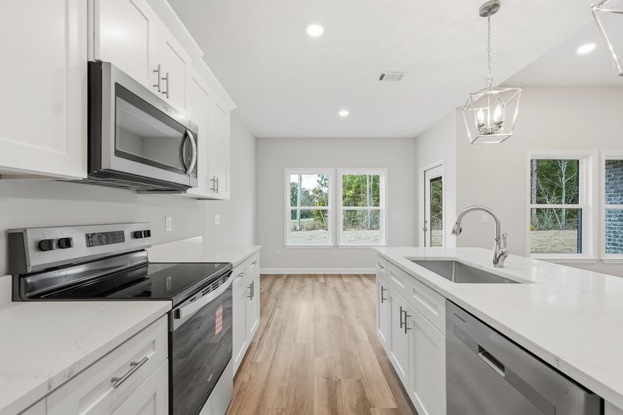 Furnished interior view inside a new home in Southern Charm, Crestview (Image 6).