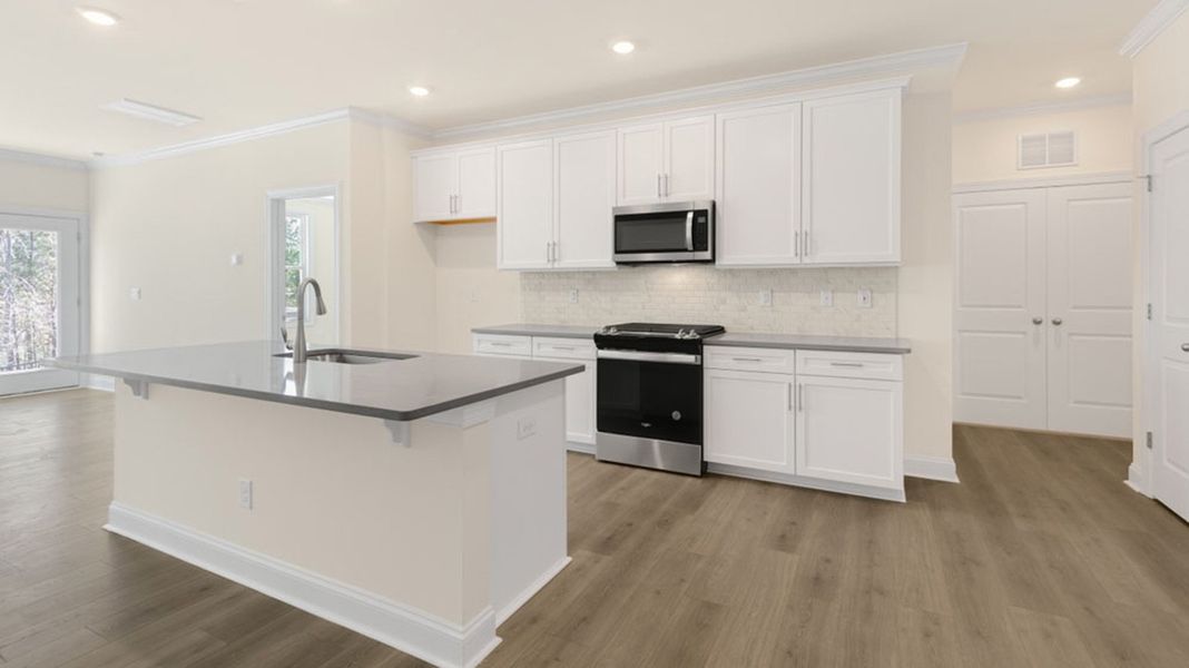 Furnished interior view inside a new home in Lybrook Village, Advance (Image 2).