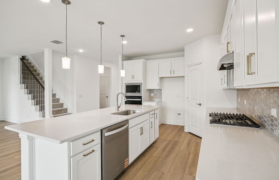 Roomy kitchen designed for functionality and comfort, with plenty of workspace  *Real home pictured