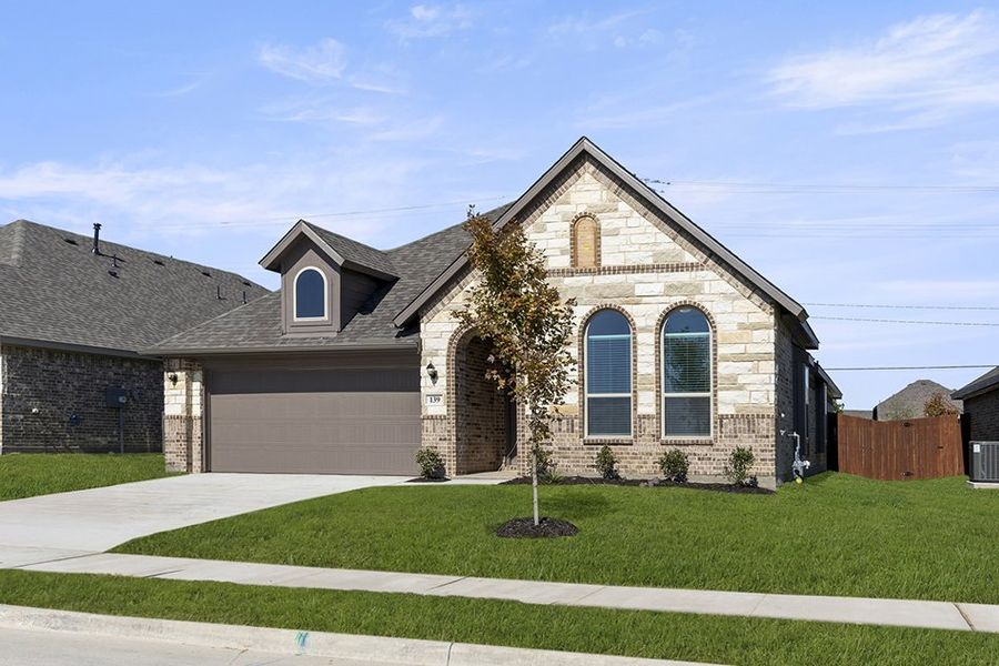 Representative exterior photo of a completed home built from the Cambridge by Impression Homes in Timberbrook, Justin, TX (Image 2). Representative exterior photo of a completed home built from the Cambridge by Impression Homes in Timberbrook, Justin, TX (Image 2).