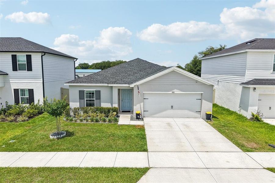 Front exterior of a new home in , Sumterville, FL, highlighting curb appeal (Image 24).