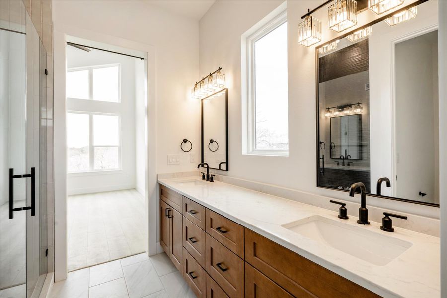 Full bath featuring double vanity