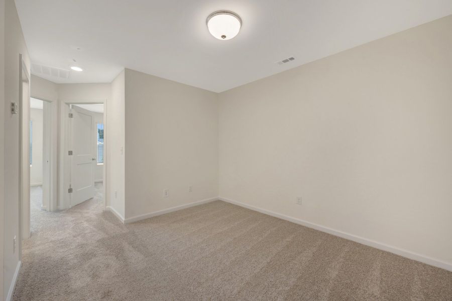 Spacious, unfurnished interior of a new home in Townes on Leesville, Durham (Image 23).