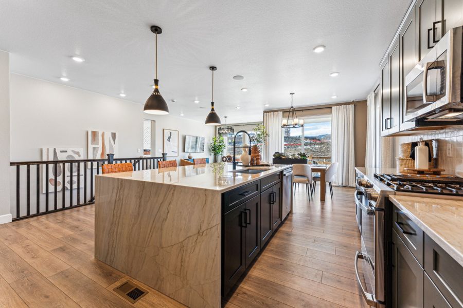 Furnished interior view inside a new home in Trailstone, Arvada (Image 6).