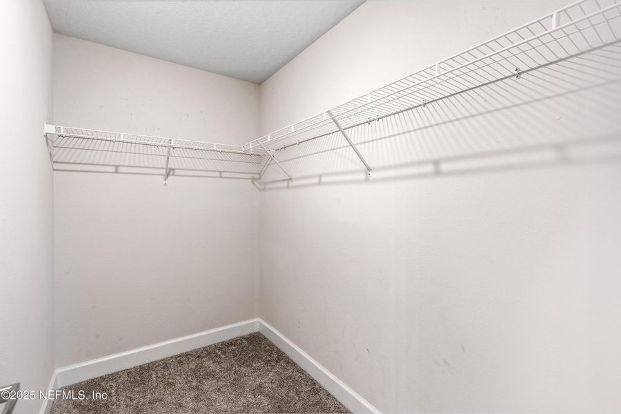 Spacious, unfurnished interior of a new home in Shadow Crest at Rolling Hills, Green Cove Springs (Image 32).