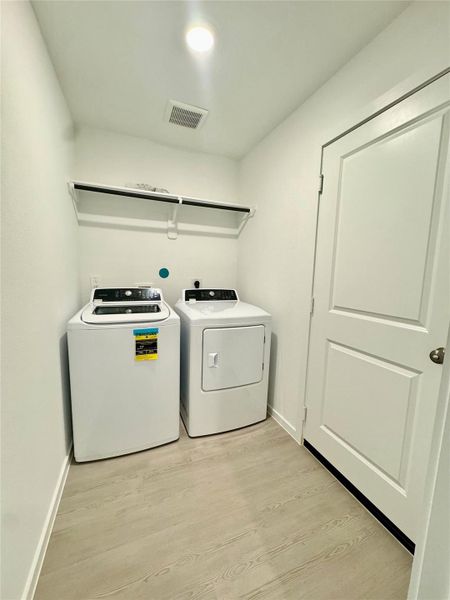 Furnished interior view inside a new home in Pinewood at Grand Texas, New Caney (Image 8).