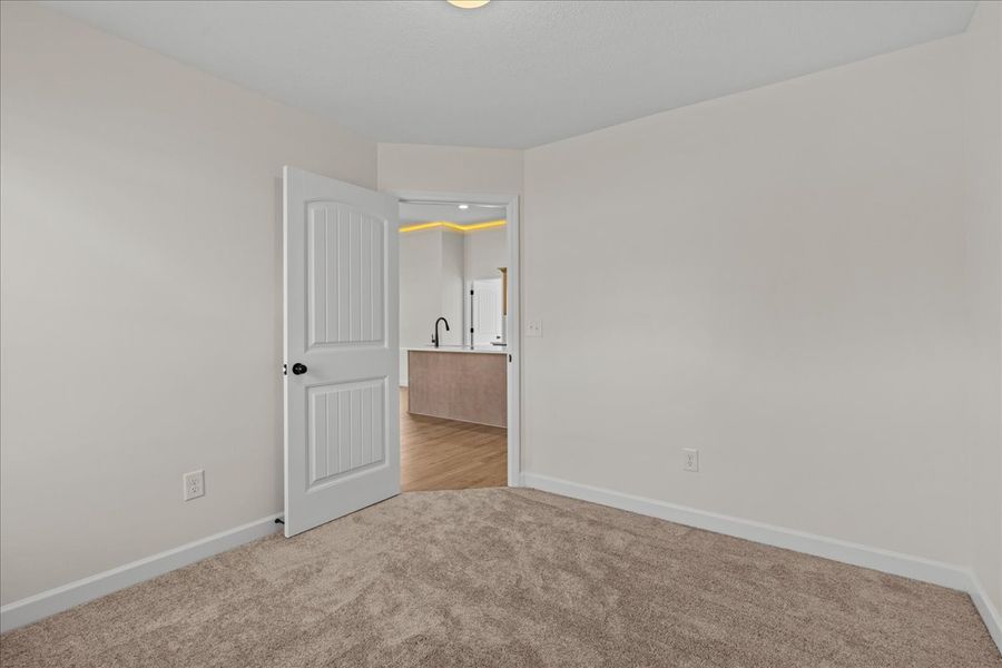 Representative unfurnished interior of a home built from the Cheshire by Enchanted Homes in Hampshire Heights, Moore (Image 31).