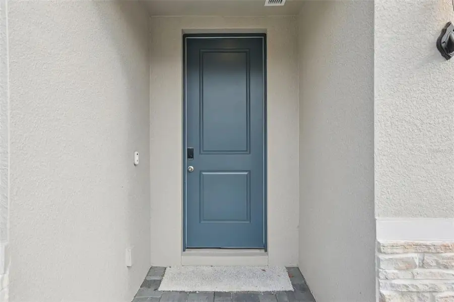 Exterior details and patio area of a home in Wynnstone - Signature Series, Davenport (Image 3).