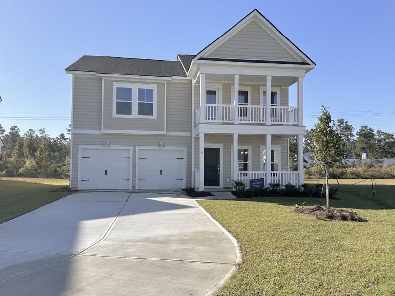Front exterior of a home in the The Farm at Morgan Lakes community, located in Pooler, GA (Image 11).