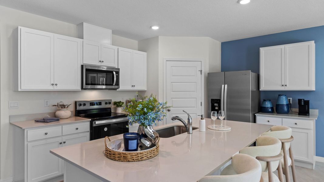 Furnished interior view inside a new home in Sun N Lake, Sebring (Image 9).