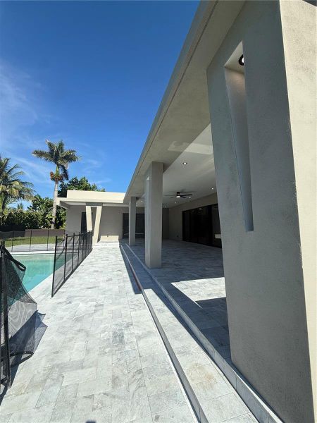 Front exterior of a new home in , Miami, FL, highlighting curb appeal (Image 25).