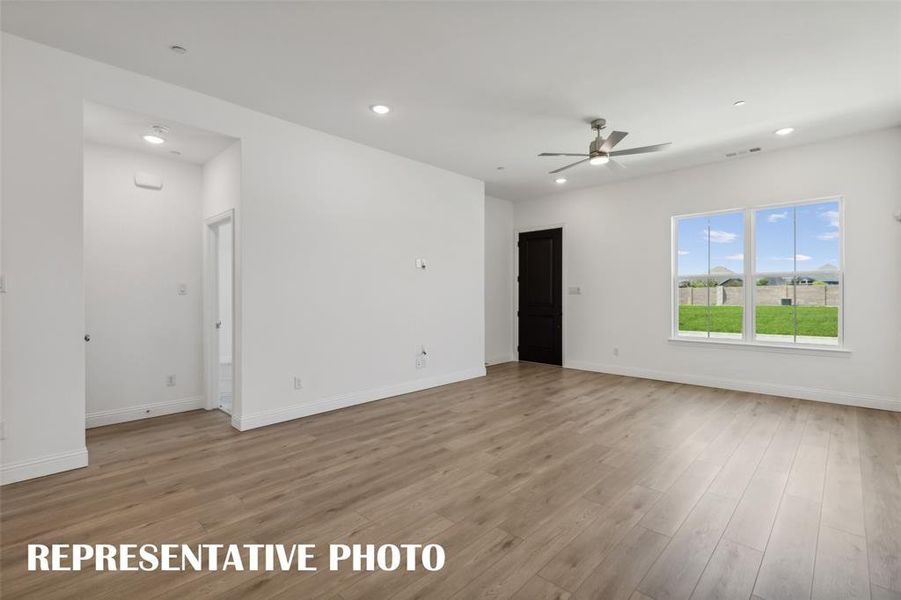 Welcome into your light and bright family room!  REPRESENTATIVE PHOTO