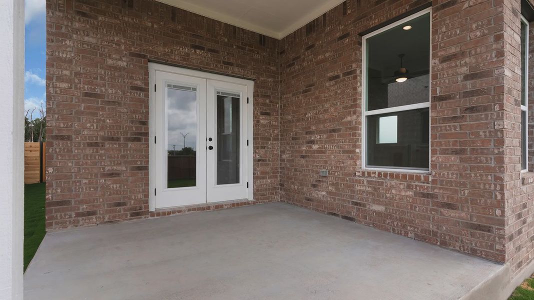 Exterior details and patio area of a home in Lariat, Liberty Hill (Image 3). Exterior details and patio area of a home in Lariat, Liberty Hill (Image 3).