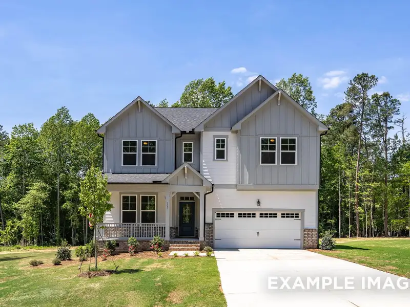 Front exterior of a new home in Wendell Ridge, Wendell, NC, highlighting curb appeal (Image 1). Front exterior of a new home in Wendell Ridge, Wendell, NC, highlighting curb appeal (Image 1).