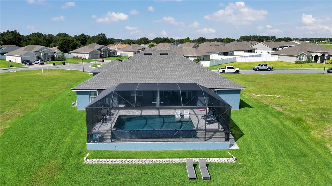 Front exterior of a new home in , Auburndale, FL, highlighting curb appeal (Image 27).