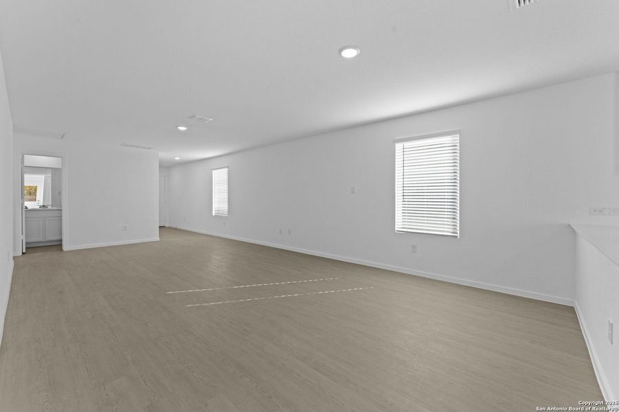 Spacious, unfurnished interior of a new home in Torian Village: Belmar Collection, San Antonio (Image 7).