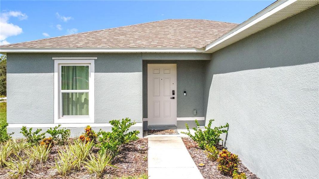 Front exterior of a new home in , Kissimmee, FL, highlighting curb appeal (Image 20). Front exterior of a new home in , Kissimmee, FL, highlighting curb appeal (Image 20).