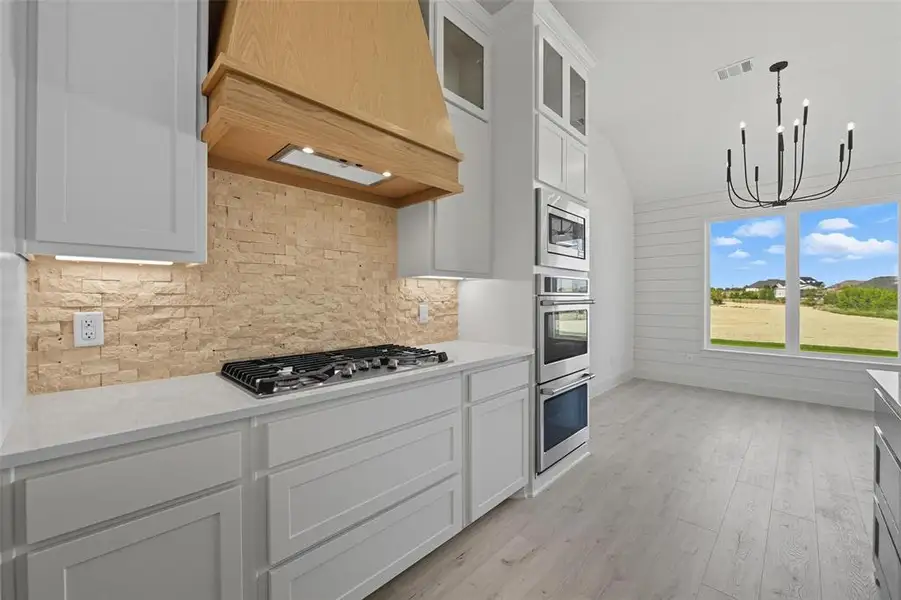 Furnished interior view inside a new home in Eagles Bluff, Willow Park (Image 5).
