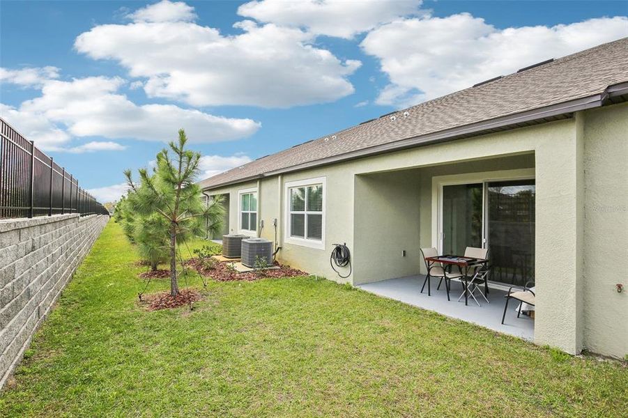 Reverse view of the patio and rear of home. Reverse view of the patio and rear of home.