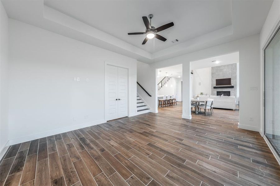 First floor game room can be used for multiple purposes. Ideal as a playroom or den, the space could easily be used as office space, pool table/games room or additional living space.