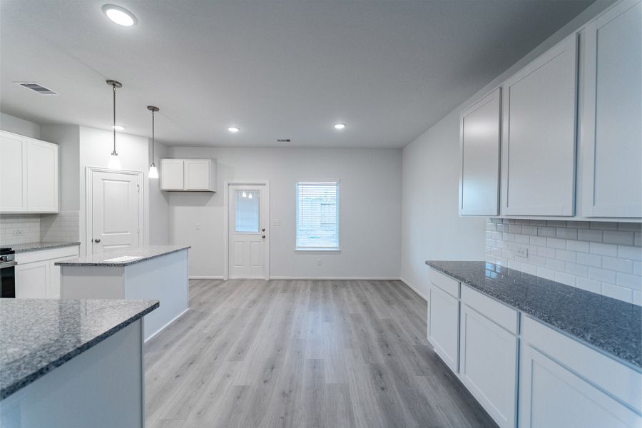 Furnished interior view inside a new home in Caney Mills, Conroe (Image 14).