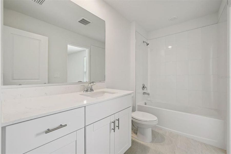 Furnished interior view inside a new home in Bradford Park, Ormond Beach (Image 8).