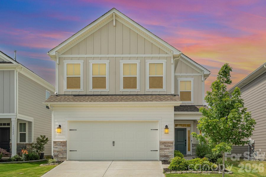 Front exterior of a new home in Village at North Reach, Charlotte, NC, highlighting curb appeal (Image 24).