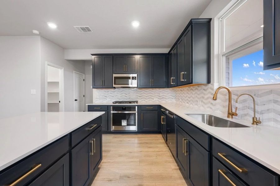 Furnished interior view inside a new home in Berry Creek Highlands, Georgetown (Image 8).