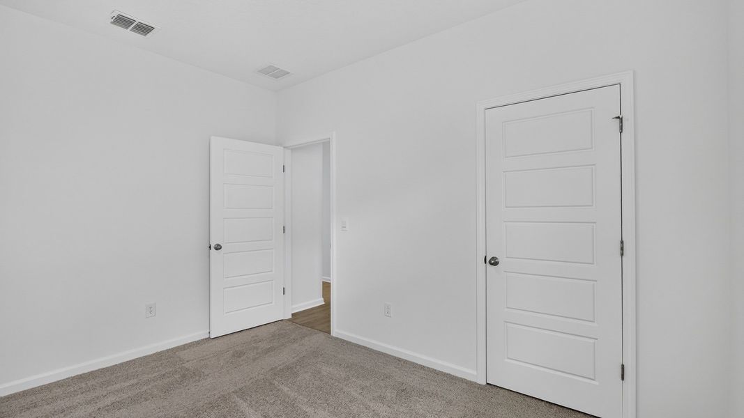 Representative unfurnished interior of a home built from the Riverside by D.R. Horton in Sawmill Branch, Palm Coast (Image 27).