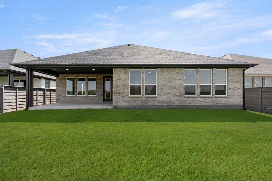 Exterior details and patio area of a home in Inspiration Collection at Union Park, Little Elm (Image 3).