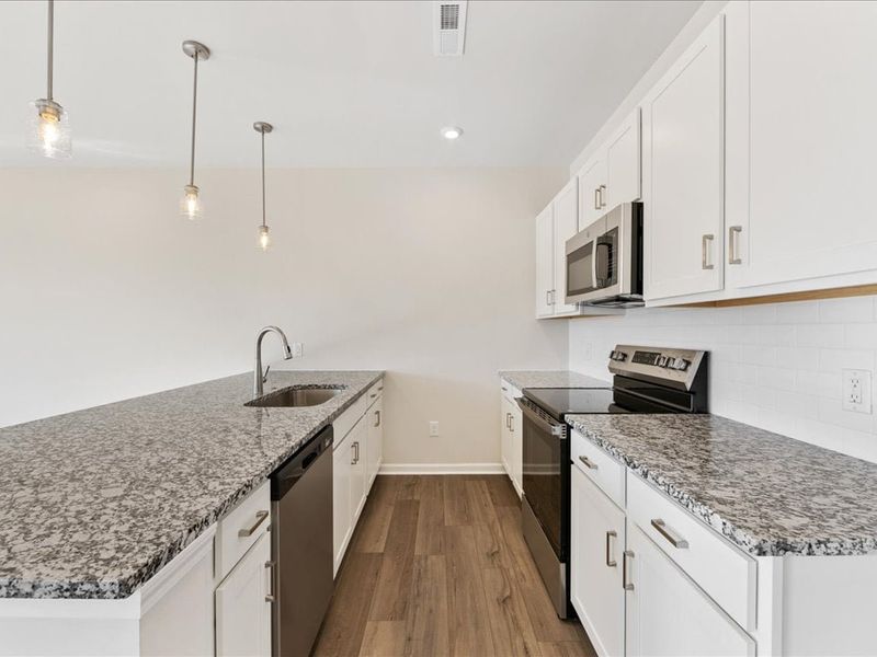 Furnished interior view inside a new home in Fifteen 15 Cannon, Charlotte (Image 8).