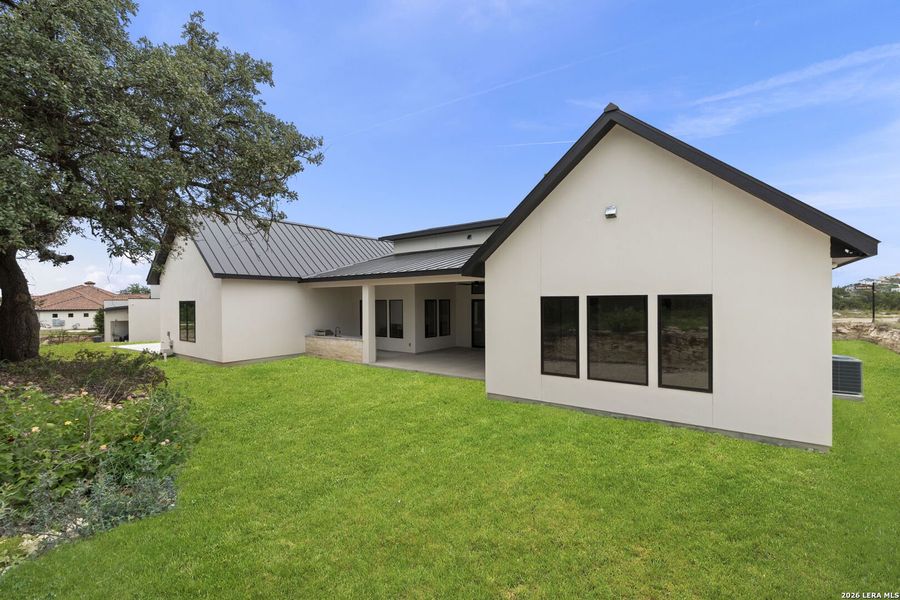 Exterior details and patio area of a home in , San Antonio (Image 41).