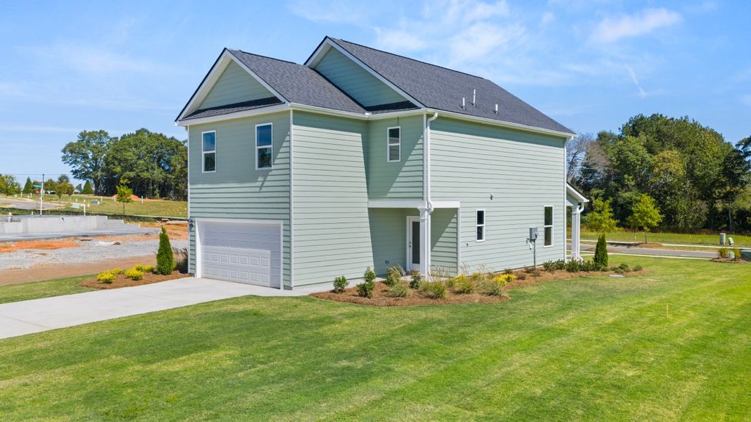 Representative exterior photo of a completed home built from the Iria Glen by D.R. Horton in Brookland Commons, Monroe, GA (Image 25).