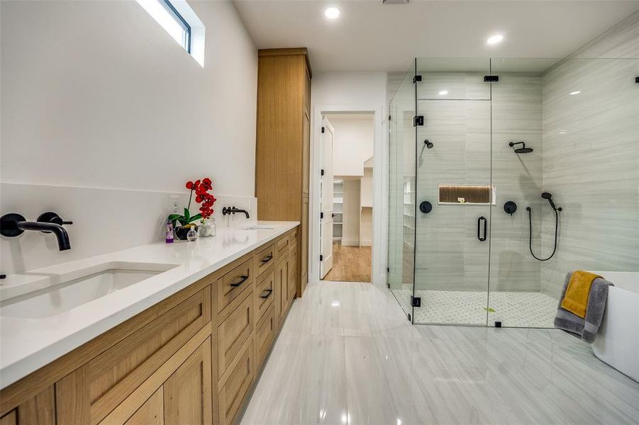 Bathroom with vanity and an enclosed shower