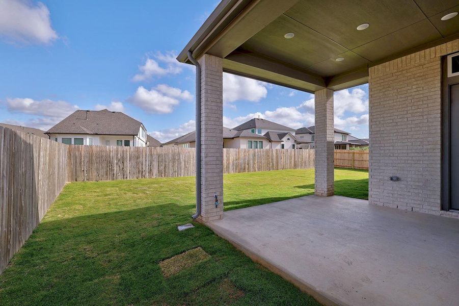 Exterior details and patio area of a home in Santa Rita Ranch, Liberty Hill (Image 18). Exterior details and patio area of a home in Santa Rita Ranch, Liberty Hill (Image 18).