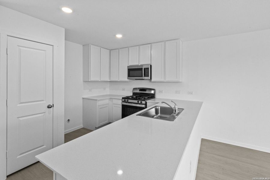 Furnished interior view inside a new home in Spring Grove, St. Hedwig (Image 6).