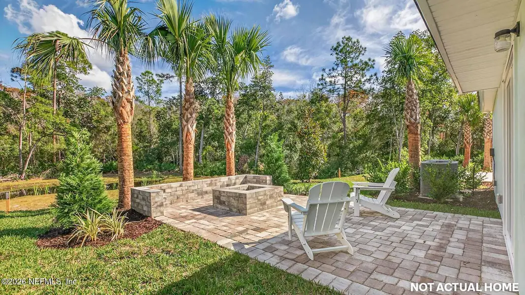 Exterior details and patio area of a home in Rookery, Green Cove Springs (Image 2).