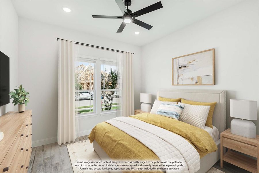 Bedroom with upholstered bed, yellow bedding, ceiling fan, and large window with white curtains