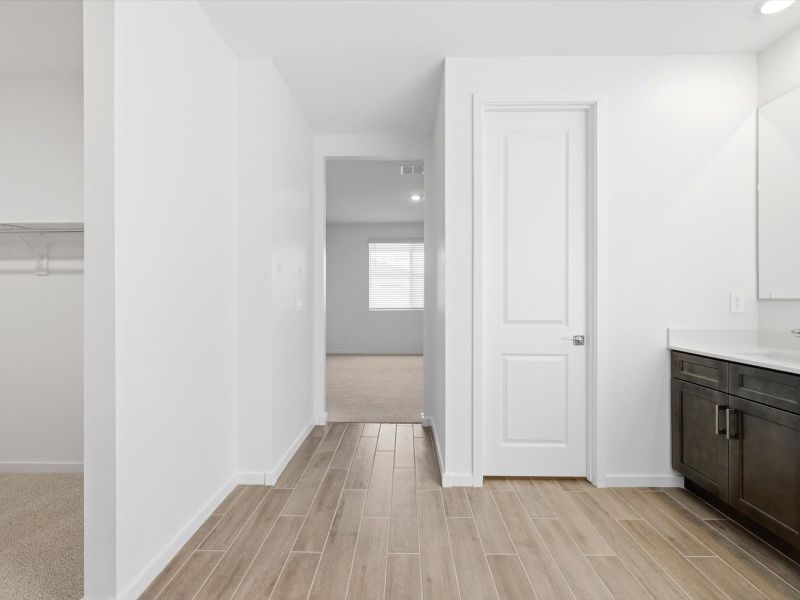 Spacious, unfurnished interior of a new home in Blossom Rock Reserve Series, Apache Junction (Image 14).