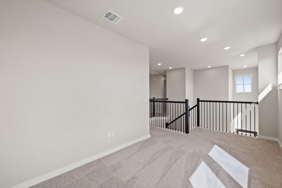 Spacious, unfurnished interior of a new home in Terrace Collection At Turner's Crossing, Buda (Image 38).