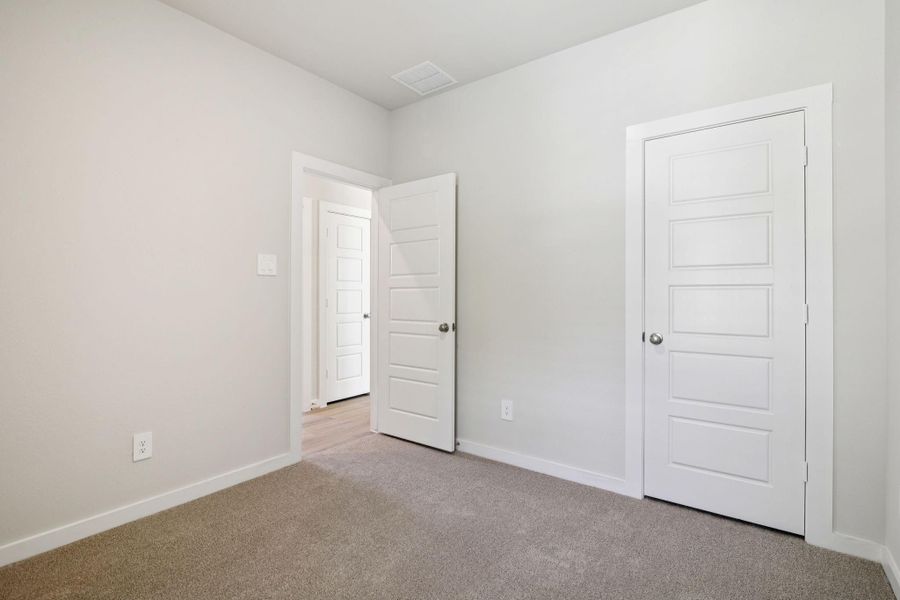 Spacious, unfurnished interior of a new home in Landing Meadows - Traditional Series, New Caney (Image 17).