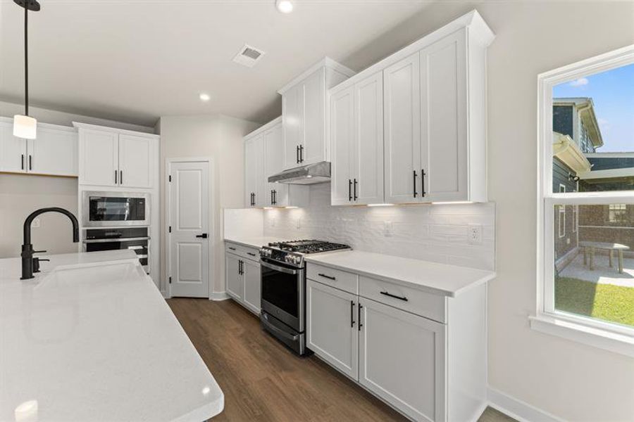 Furnished interior view inside a new home in Indigo Bay, Myrtle Beach (Image 6).