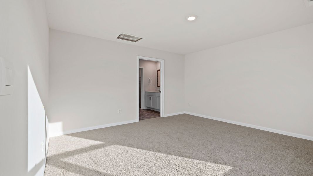 Representative unfurnished interior of a home built from the Macon by D.R. Horton in Bentley Park, Greenwood (Image 22).