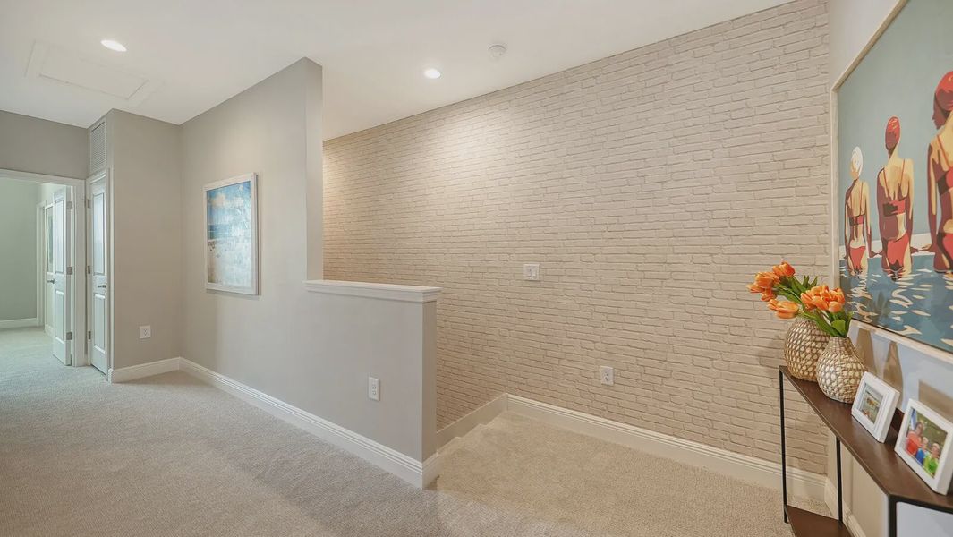 Representative furnished interior of a home built from the Avery by Neal Communities in SkySail, Naples (Image 5).