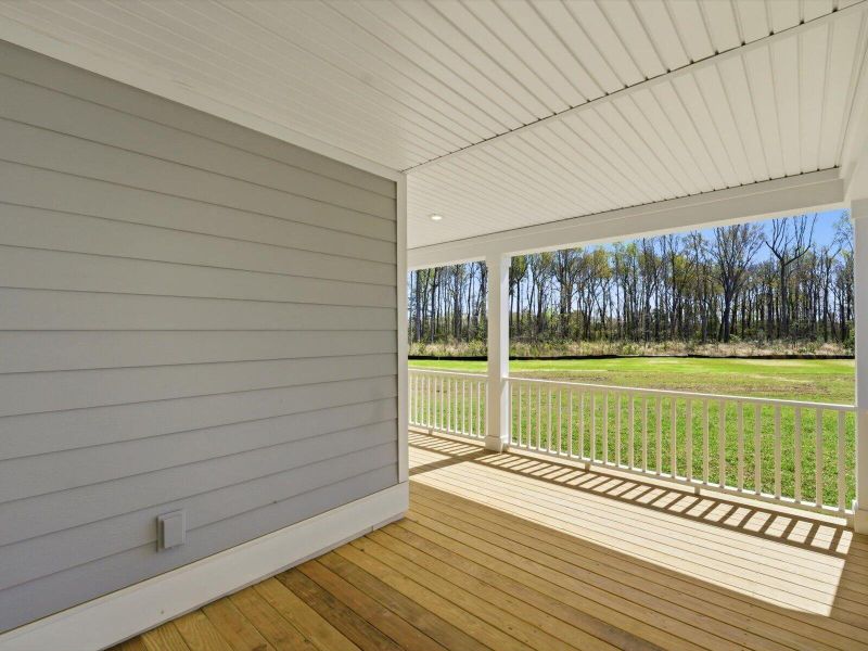 Exterior details and patio area of a home in The Coves at Lakes of Cane Bay, Summerville (Image 4). Exterior details and patio area of a home in The Coves at Lakes of Cane Bay, Summerville (Image 4).